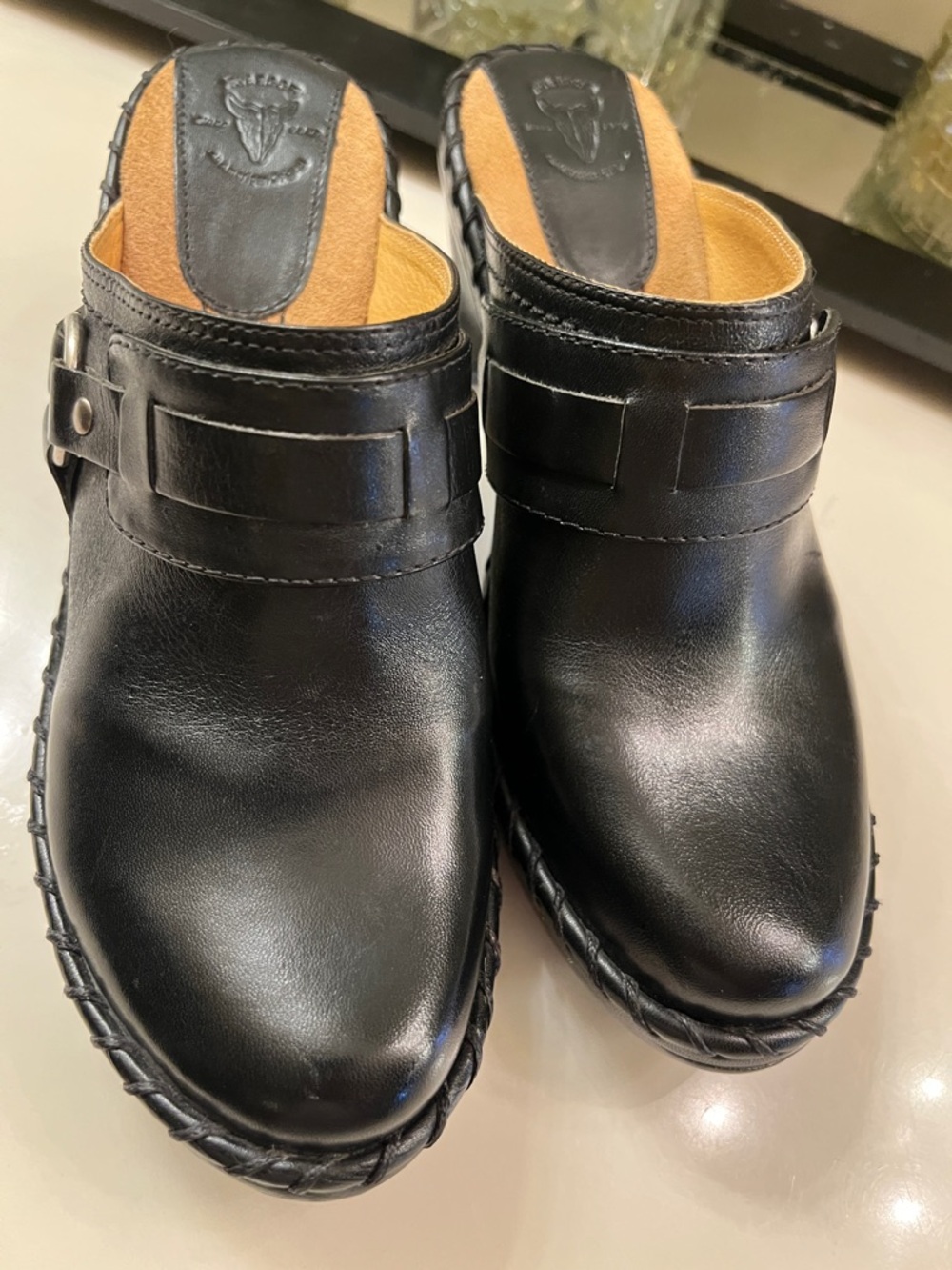 Frye Black Leather Slip-On Clogs with Strap Detail
